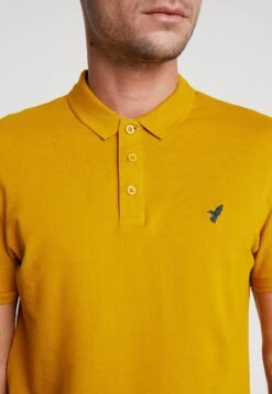 Pier One Poloshirt - Mustard -mode 13eaaef1d672490cb1dfa42962ec1ff3